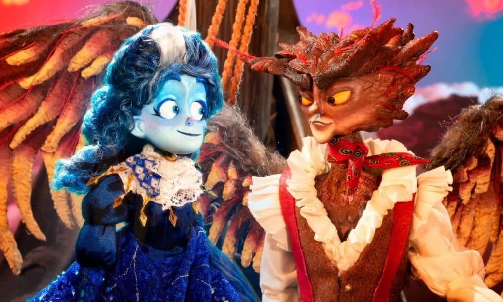 Personajes principales de la película animada "Soy Frankelda", con un fondo colorido y elementos de la técnica stop-motion.